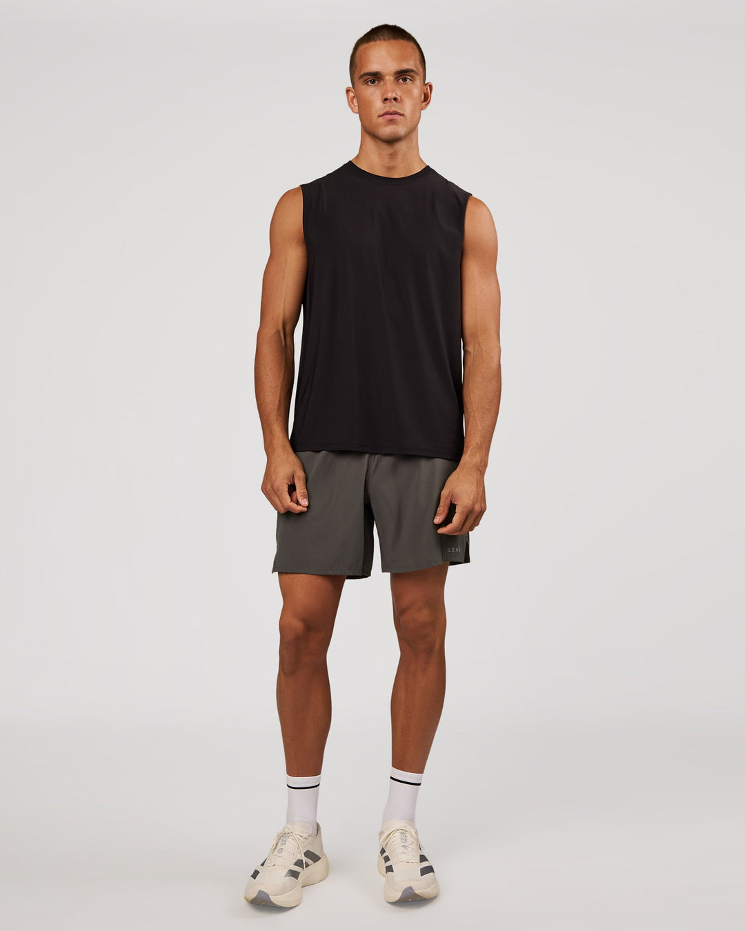 Man wearing Cadence Swift Muscle Tank - Black | Model:Albert | Size:M - view 4