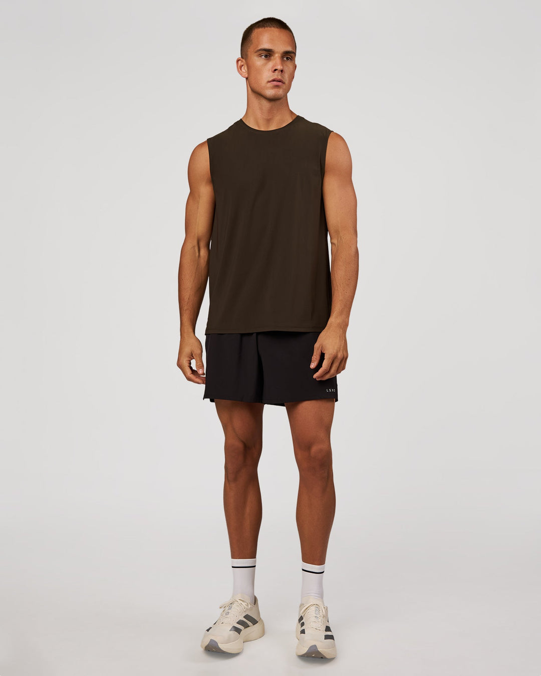 Man wearing Cadence Swift Muscle Tank - Ground Coffee | Model:Albert | Size:M - view 4