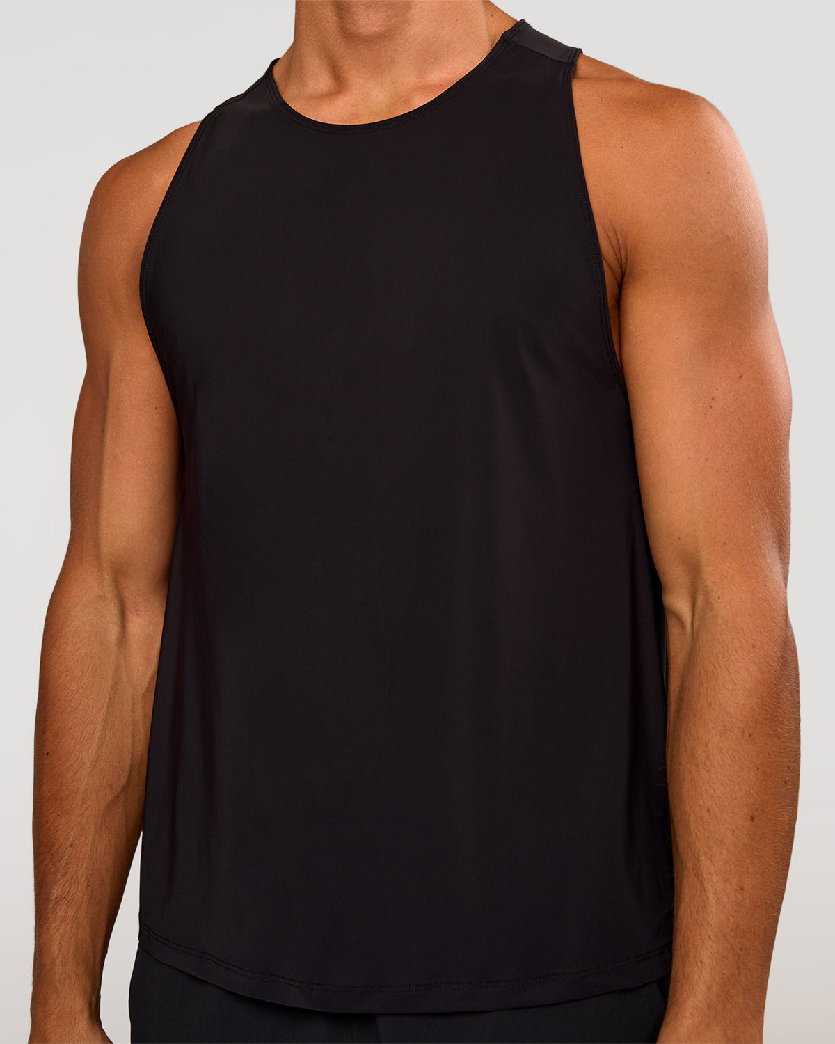 Man wearing Cadence Swift Tank - Black | Model:Albert | Size:M