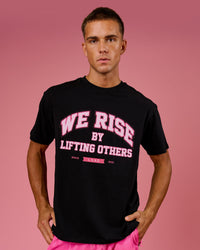Man wearing BCAM FLXCotton Graphic Oversized Tee - Black | Model:Albert | Size:M | Thumbnail Index: 1