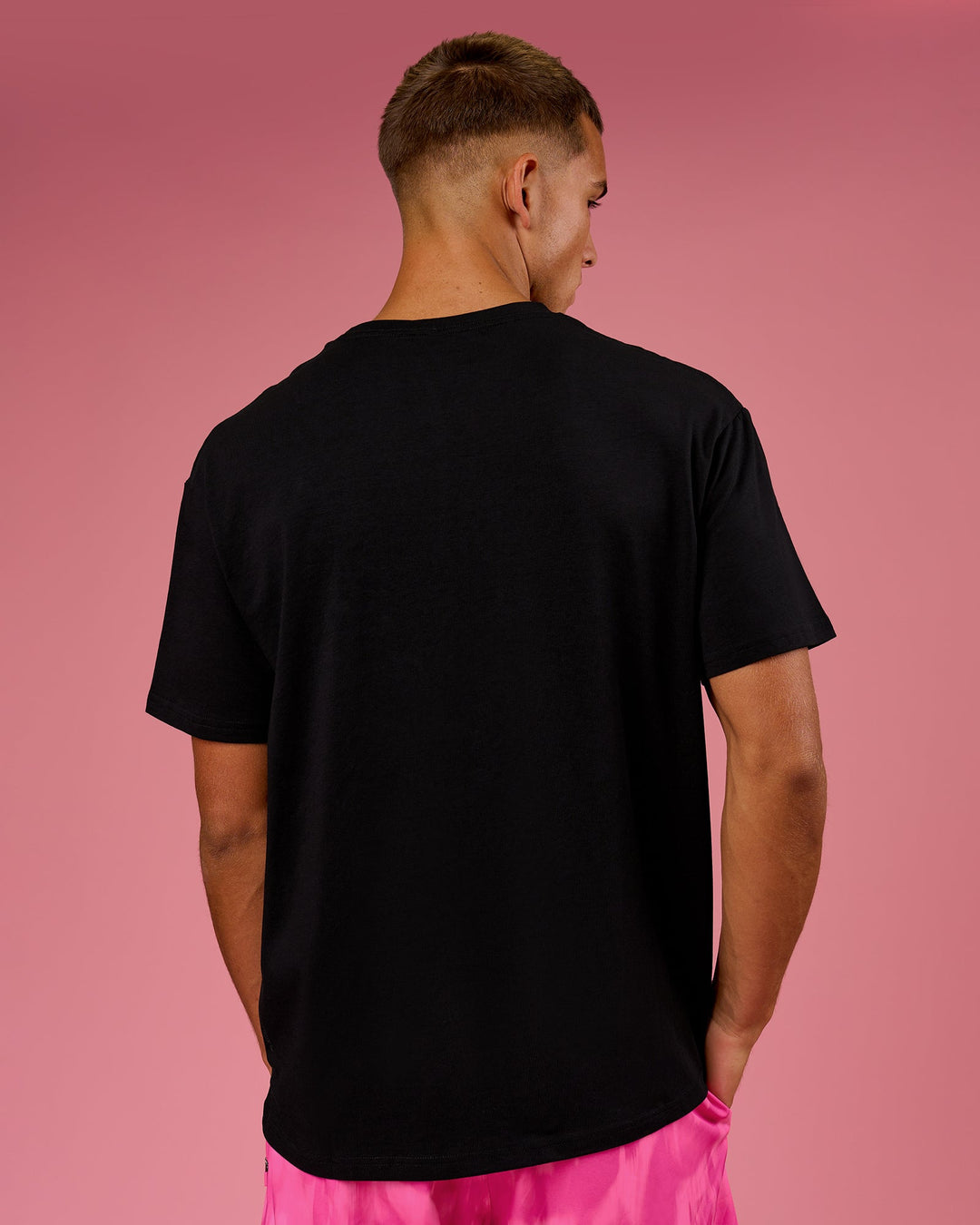 Man wearing BCAM FLXCotton Graphic Oversized Tee - Black | Model:Albert | Size:M - view 5