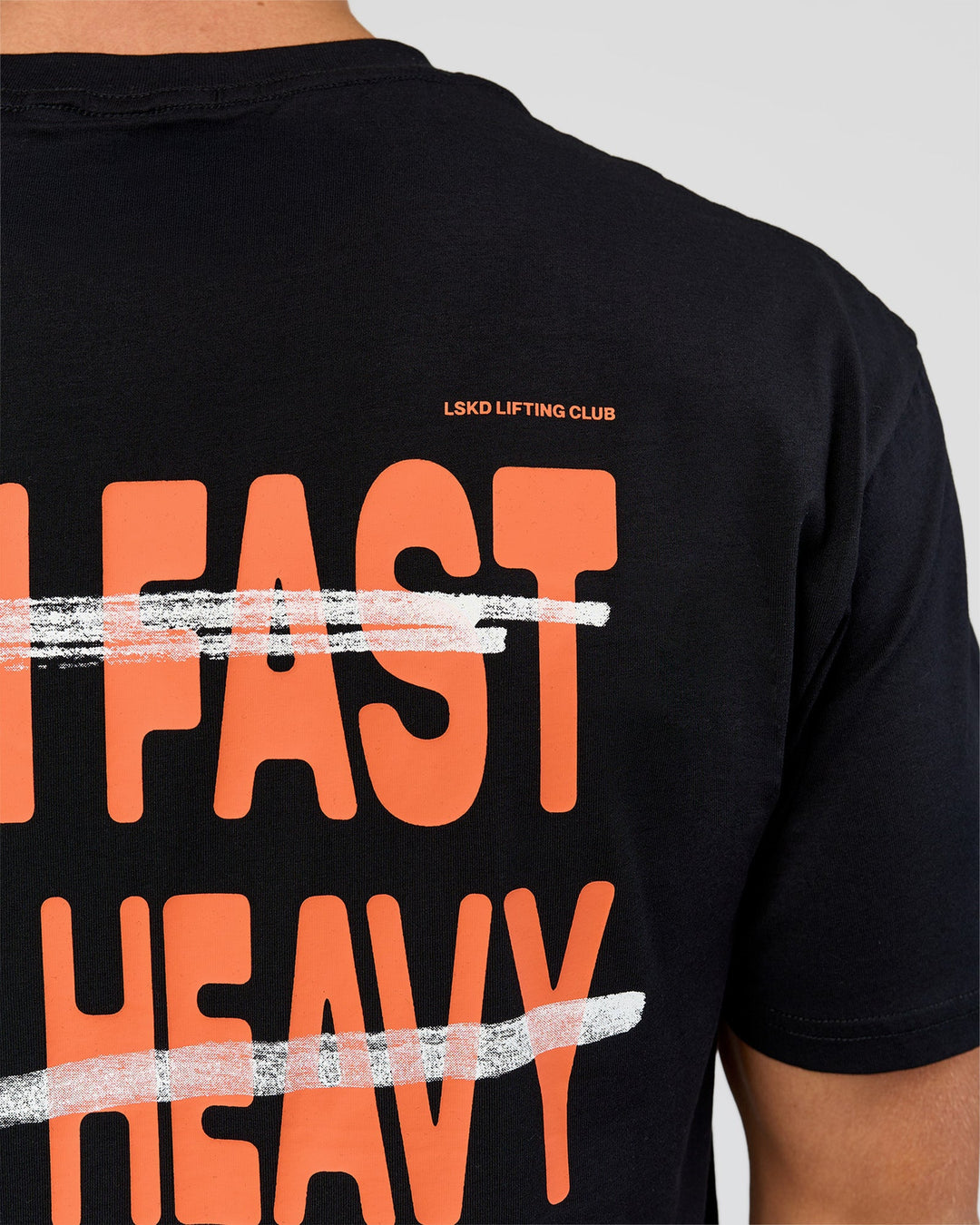 Man wearing Coffee Run FLXCotton Oversized Tee - Black-Ultra Orange | Model:Albert | Size:M - view 9