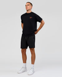 Man wearing Coffee Run FLXCotton Oversized Tee - Black-Ultra Orange | Model:Albert | Size:M | Thumbnail Index: 12