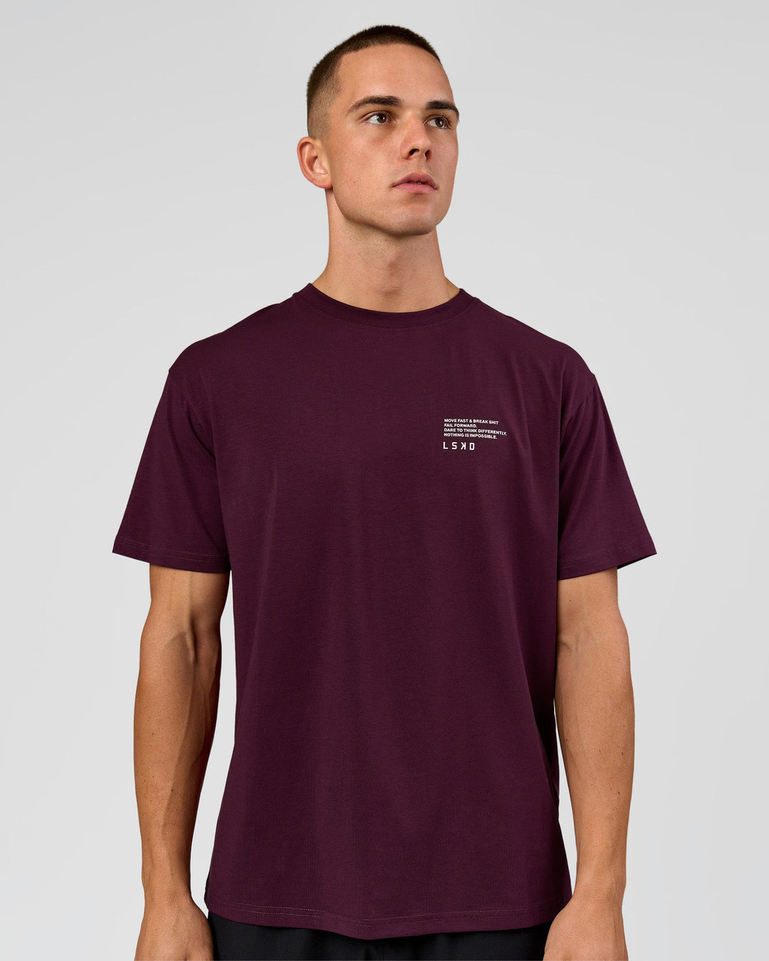 Man wearing Coffee Run FLXCotton Oversized Tee - Cherry Lacquer-Black | Model:Albert | Size:M - view 5