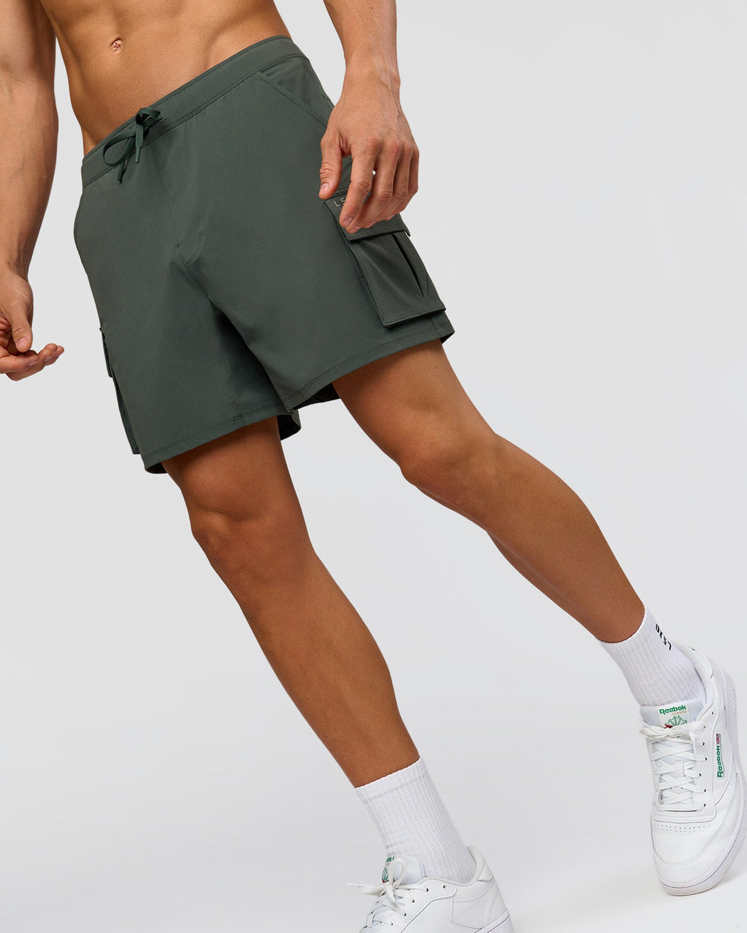 Man wearing Functional Cargo 6" Short - Carbon Green | Model:Albert | Size:M - view 11