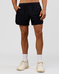 Man wearing Hybrid 5" Short - Black-Reflective | Model:Albert | Size:M | Thumbnail Index: 3