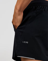 Man wearing Hybrid 5" Short - Black-Reflective | Model:Albert | Size:M | Thumbnail Index: 1
