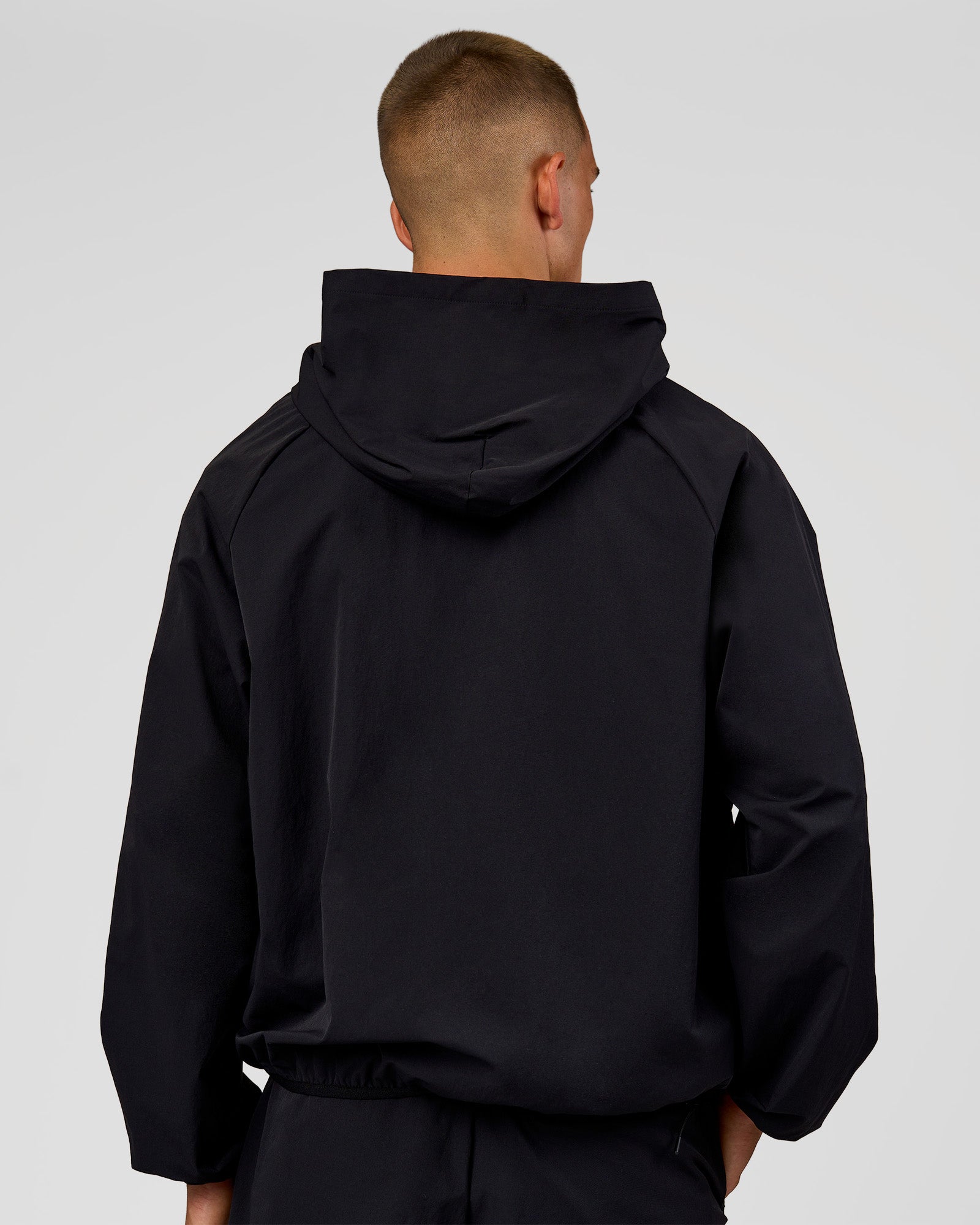 Man wearing Motion Hooded Jacket - Black | Model:Albert | Size:M