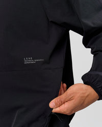 Man wearing Motion Hooded Jacket - Black | Model:Albert | Size:M | Thumbnail Index: 8