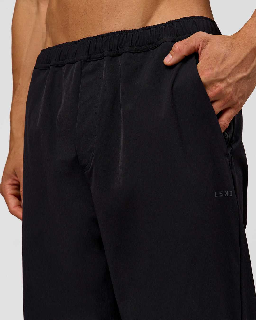 Man wearing Motion Wide Leg Pant - Black | Model:Albert | Size:M - view 8