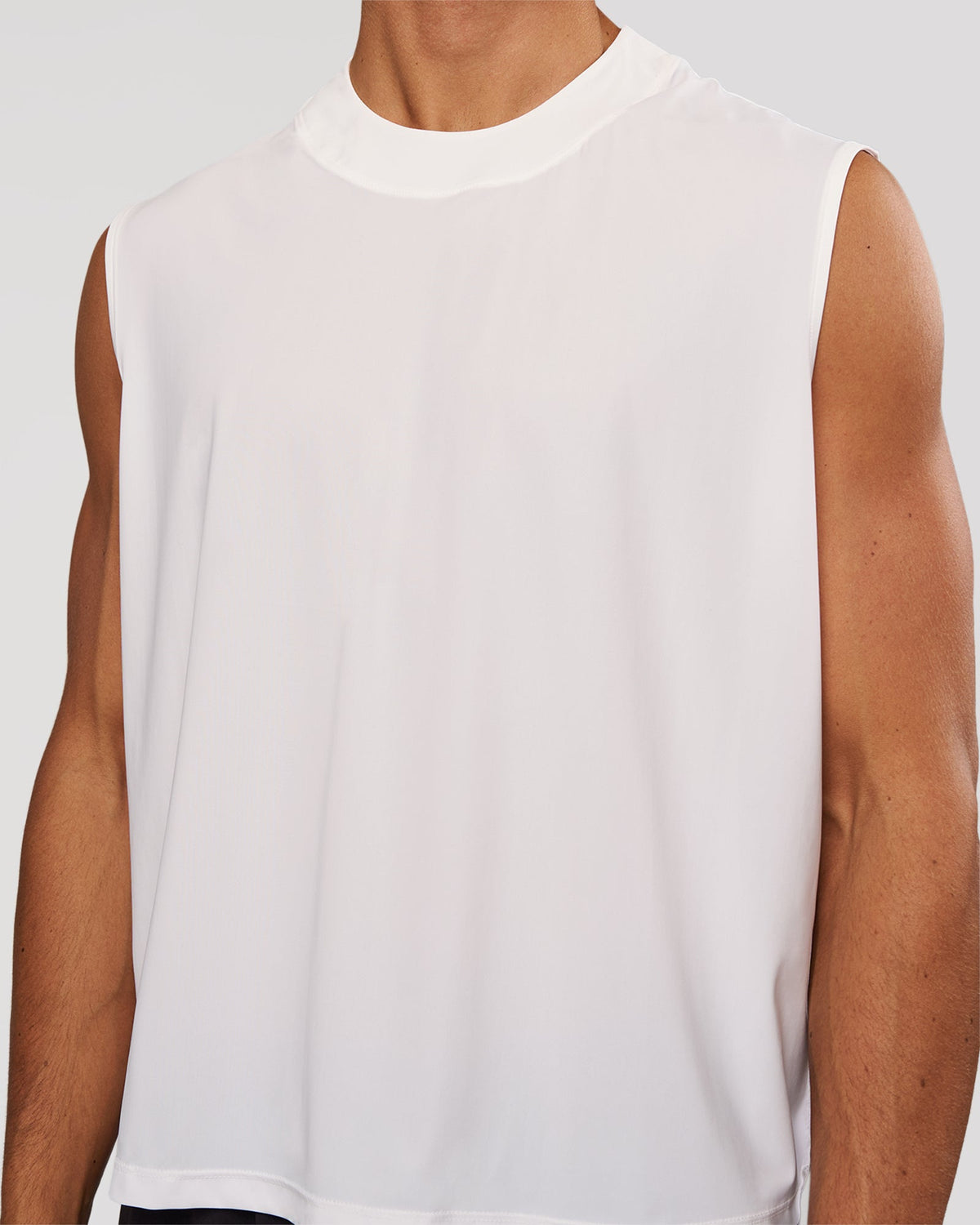 Man wearing Motionline Boxy Tank - White | Model:Albert | Size:M - view 2