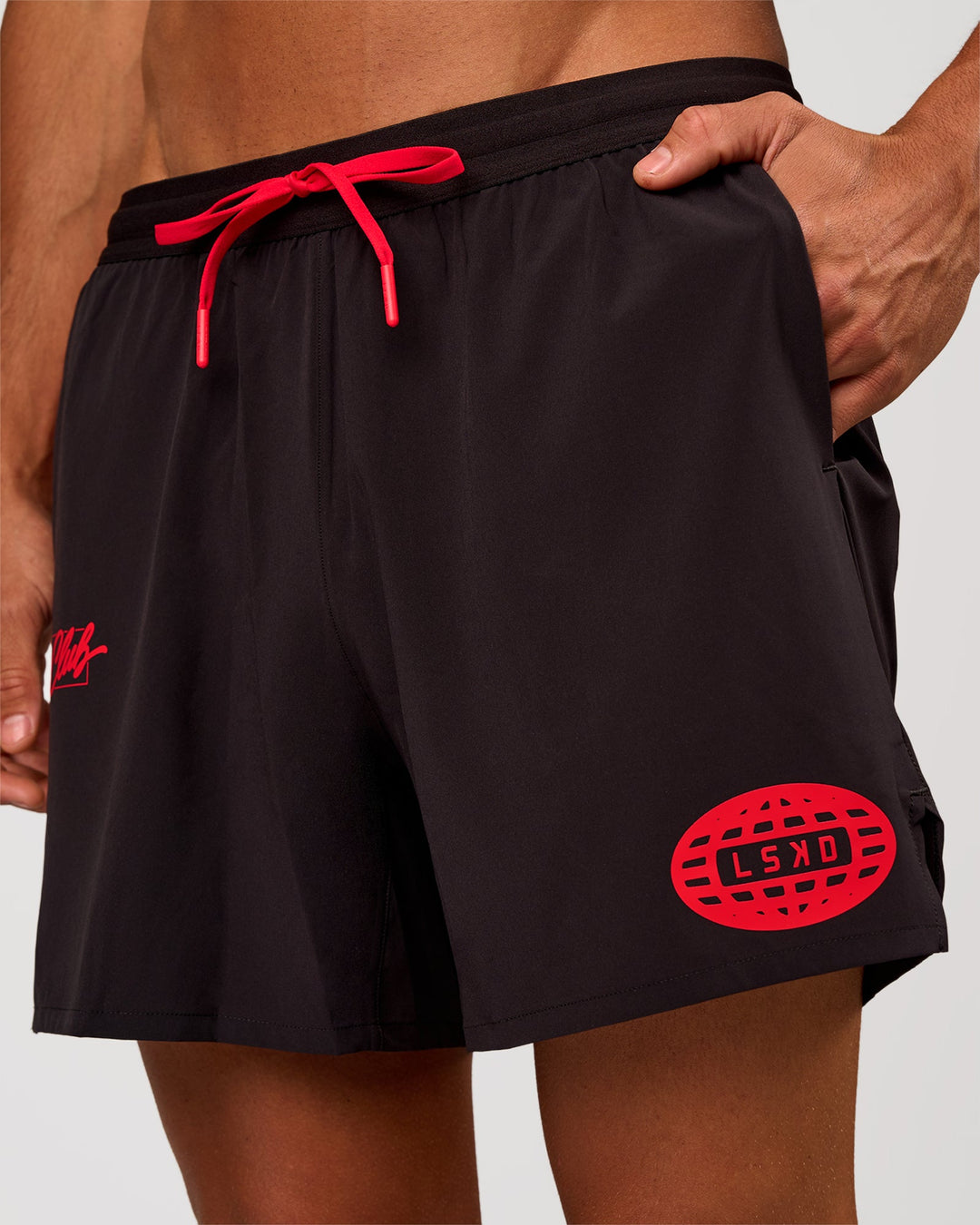 Man wearing Pace 5" Lined Running Short - Black-Scarlet | Model:Albert | Size:M - view 3