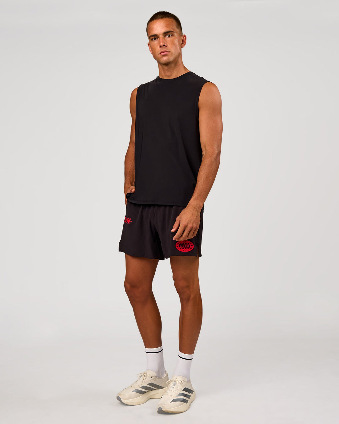 Man wearing Pace 5" Lined Running Short - Black-Scarlet | Model:Albert | Size:M - view 5