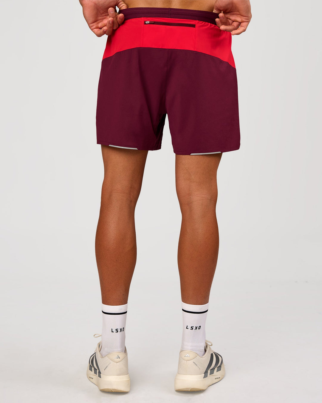 Man wearing Pace 5" Lined Running Short - Cherry Lacquer-Scarlet | Model:Albert | Size:M - view 5