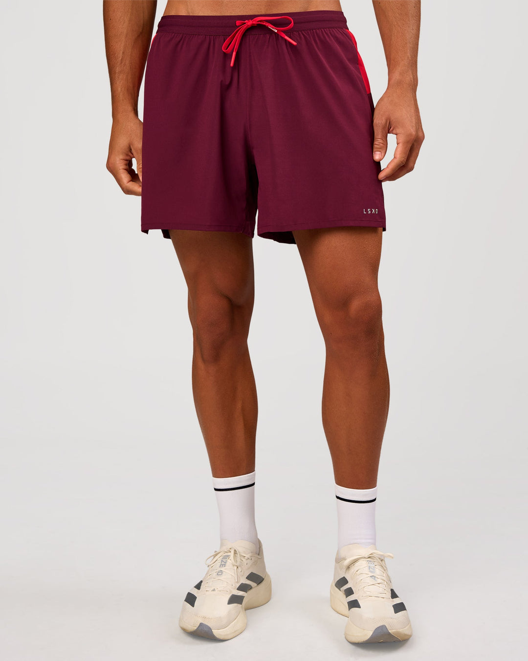 Man wearing Pace 5" Lined Running Short - Cherry Lacquer-Scarlet | Model:Albert | Size:M - view 6