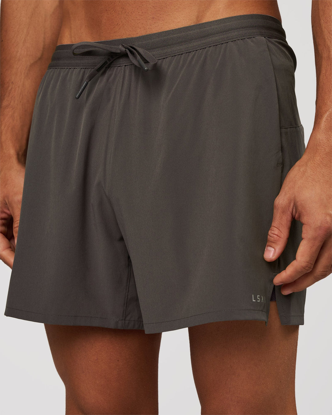Man wearing Pace 5" Lined Running Short - Dark Storm | Model:Albert | Size:M - view 1