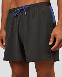 Man wearing Pace 5" Lined Running Short - Dark Storm-Bluebell | Model:Albert | Size:M | Thumbnail Index: 0
