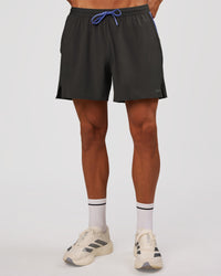 Man wearing Pace 5" Lined Running Short - Dark Storm-Bluebell | Model:Albert | Size:M | Thumbnail Index: 4