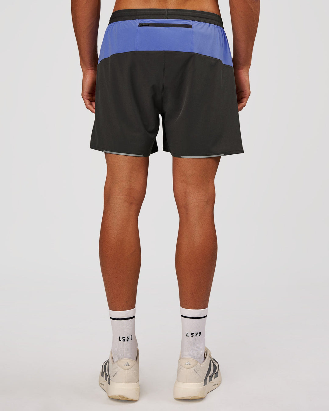 Man wearing Pace 5" Lined Running Short - Dark Storm-Bluebell | Model:Albert | Size:M - view 9