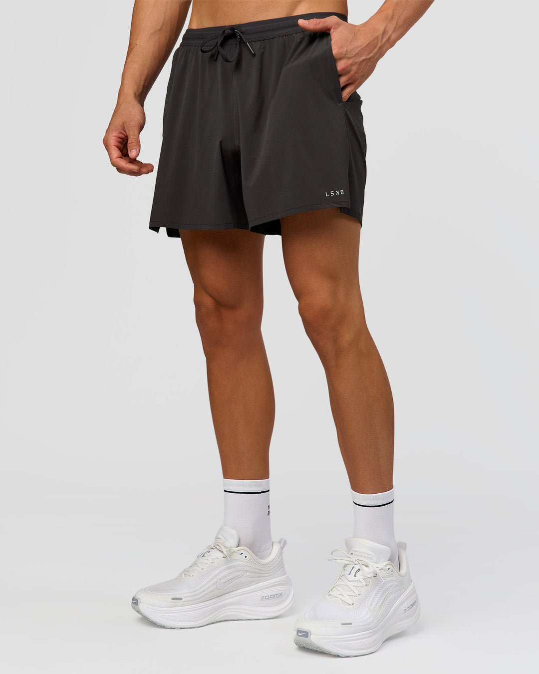 Man wearing Pace 5" Running Short - Black-Onyx | Model:Albert | Size:M