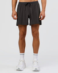 Man wearing Pace 5" Running Short - Black-Onyx | Model:Albert | Size:M