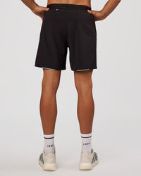 Man wearing Pace 7" Lined Running Short - Black-Reflective | Model:Albert | Size:M | Thumbnail Index: 4