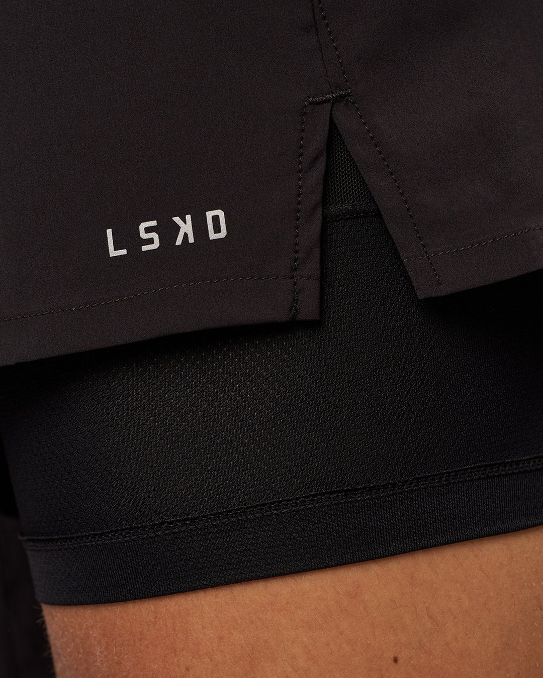 Man wearing Pace 7" Lined Running Short - Black-Reflective | Model:Albert | Size:M - view 4
