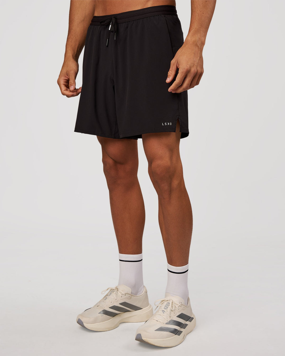 Man wearing Pace 7" Lined Running Short - Black-Reflective | Model:Albert | Size:M - view 7