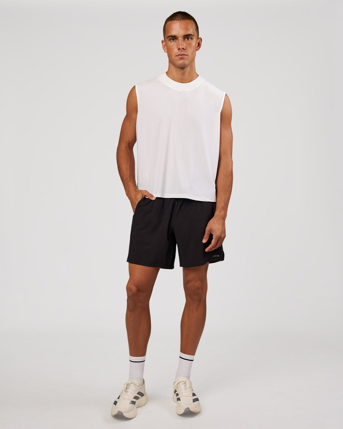Man wearing Pace 7" Lined Running Short - Black-Reflective | Model:Albert | Size:M