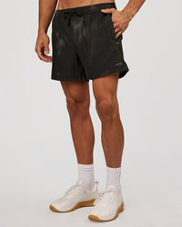 Man wearing Rep 5" Performance Short - Bitmap Blur Black | Model:Albert | Size:M | Thumbnail Index: 4