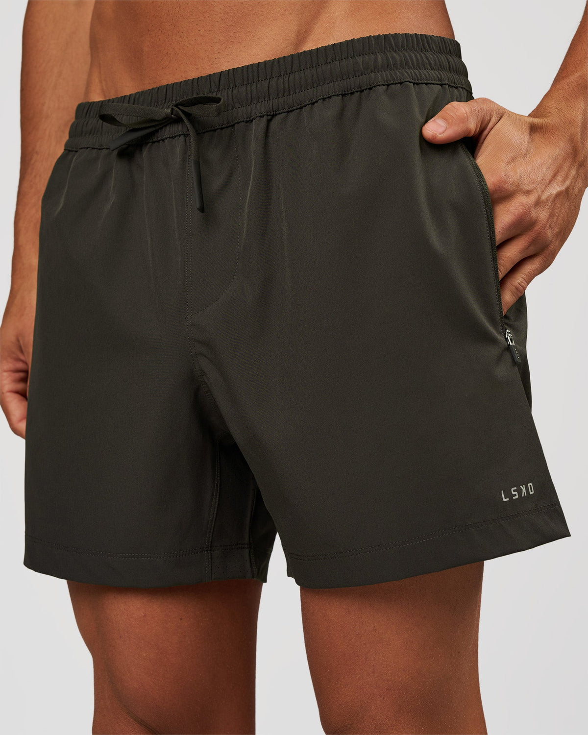 Man wearing Rep 5" Performance Short - Onyx | Model:Albert | Size:M