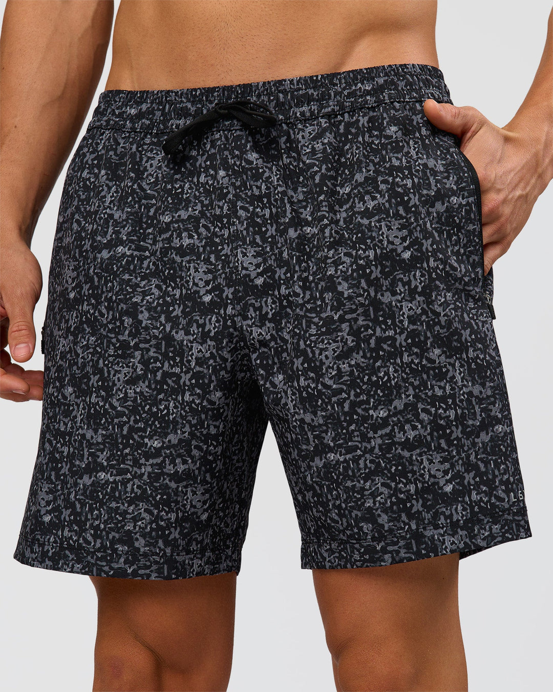 Man wearing Rep 7" Performance Short - Energy Print Black | Model:Albert | Size:M - view 1