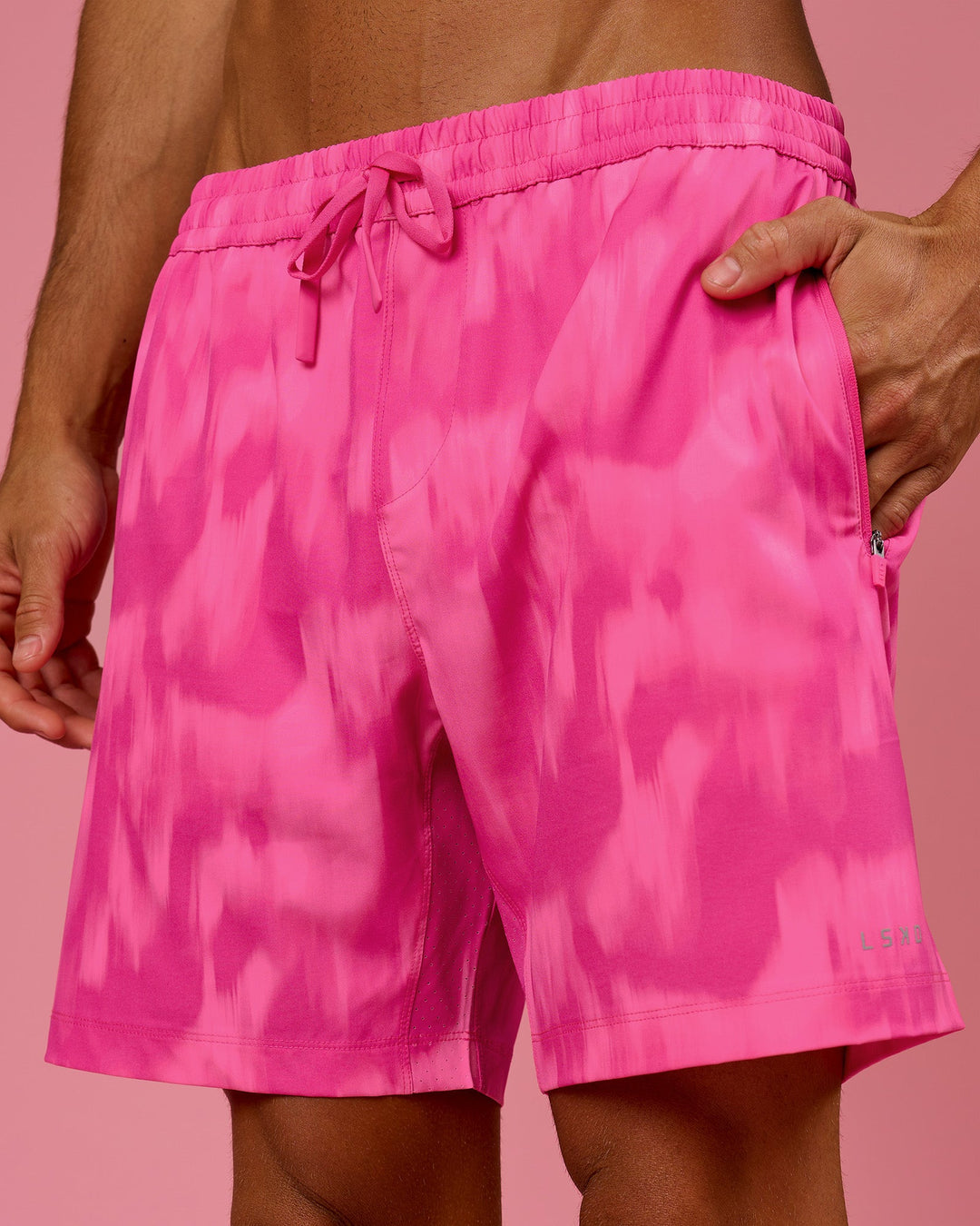 Man wearing Rep 7" Performance Short - Radiant Pink | Model:Albert | Size:M - view 1