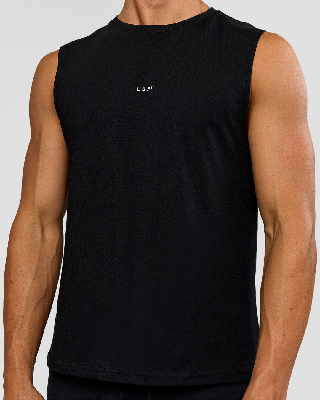 Man wearing Run Club FLXCotton Tank - Black-Electric Indigo | Model:Albert | Size:M