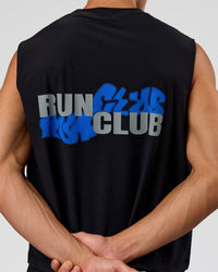 Man wearing Run Club Elevate Muscle Tank - Black-Electric Indigo | Model:Albert | Size:M
