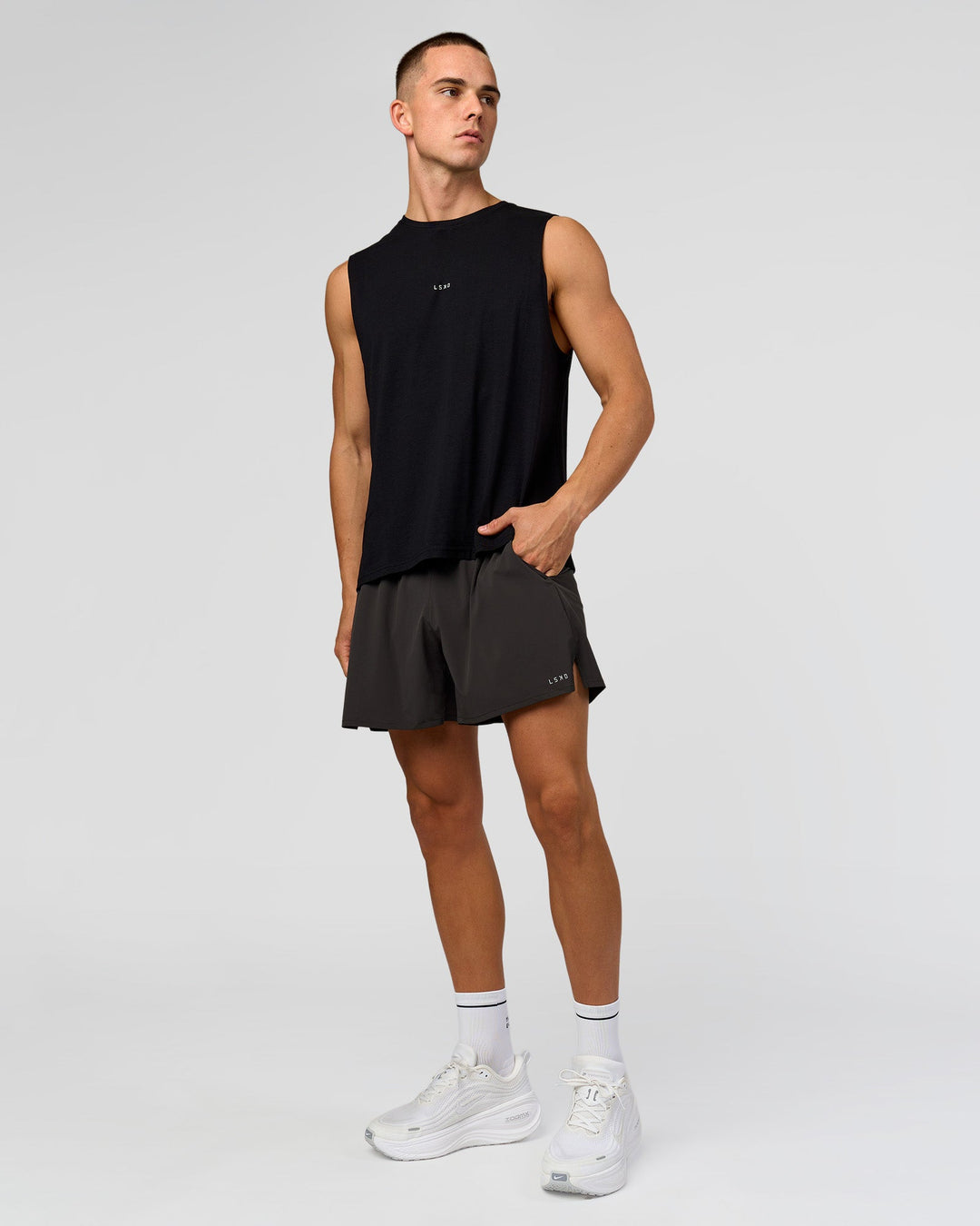 Man wearing Run Club FLXCotton Tank - Black-White | Model:Albert | Size:M