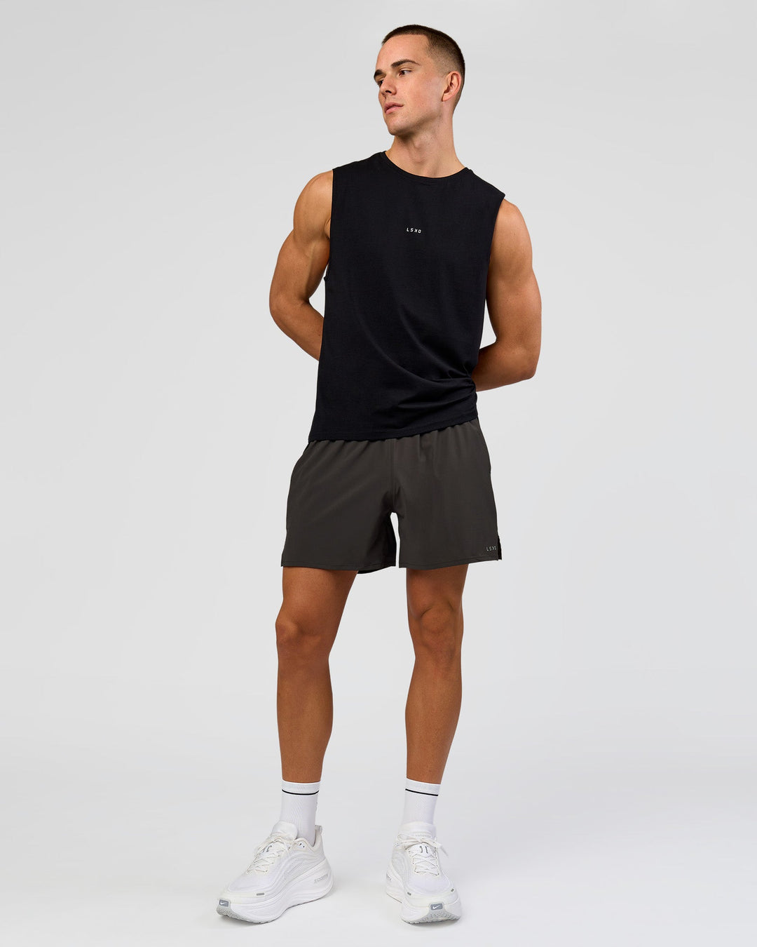 Man wearing Run Club FLXCotton Tank - Black-White | Model:Albert | Size:M