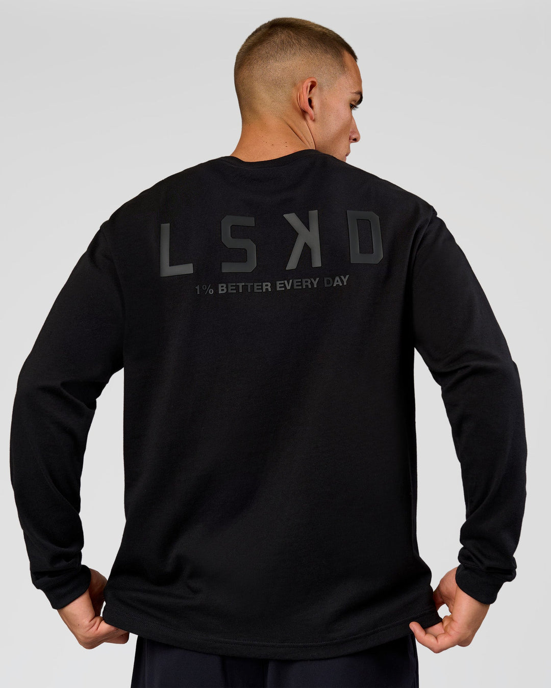 Man wearing Tonal Legacy Heavyweight Oversized LS Tee - Black-Black | Model:Albert | Size:M - view 1