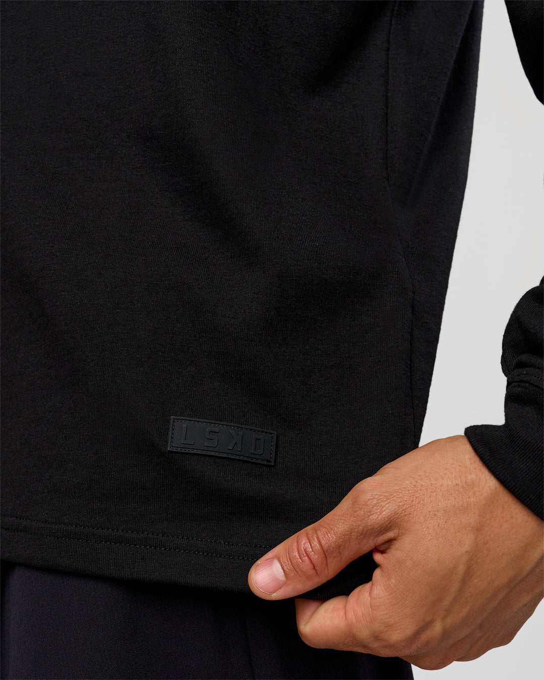 Man wearing Tonal Legacy Heavyweight Oversized LS Tee - Black-Black | Model:Albert | Size:M - view 6