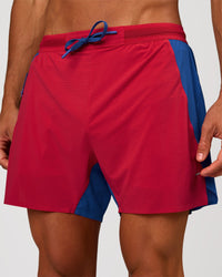 Man wearing UltraAir 5" Lined Performance Short - Scarlet-Electric Indigo | Model: Albert | Size: M | Thumbnail Index: 0