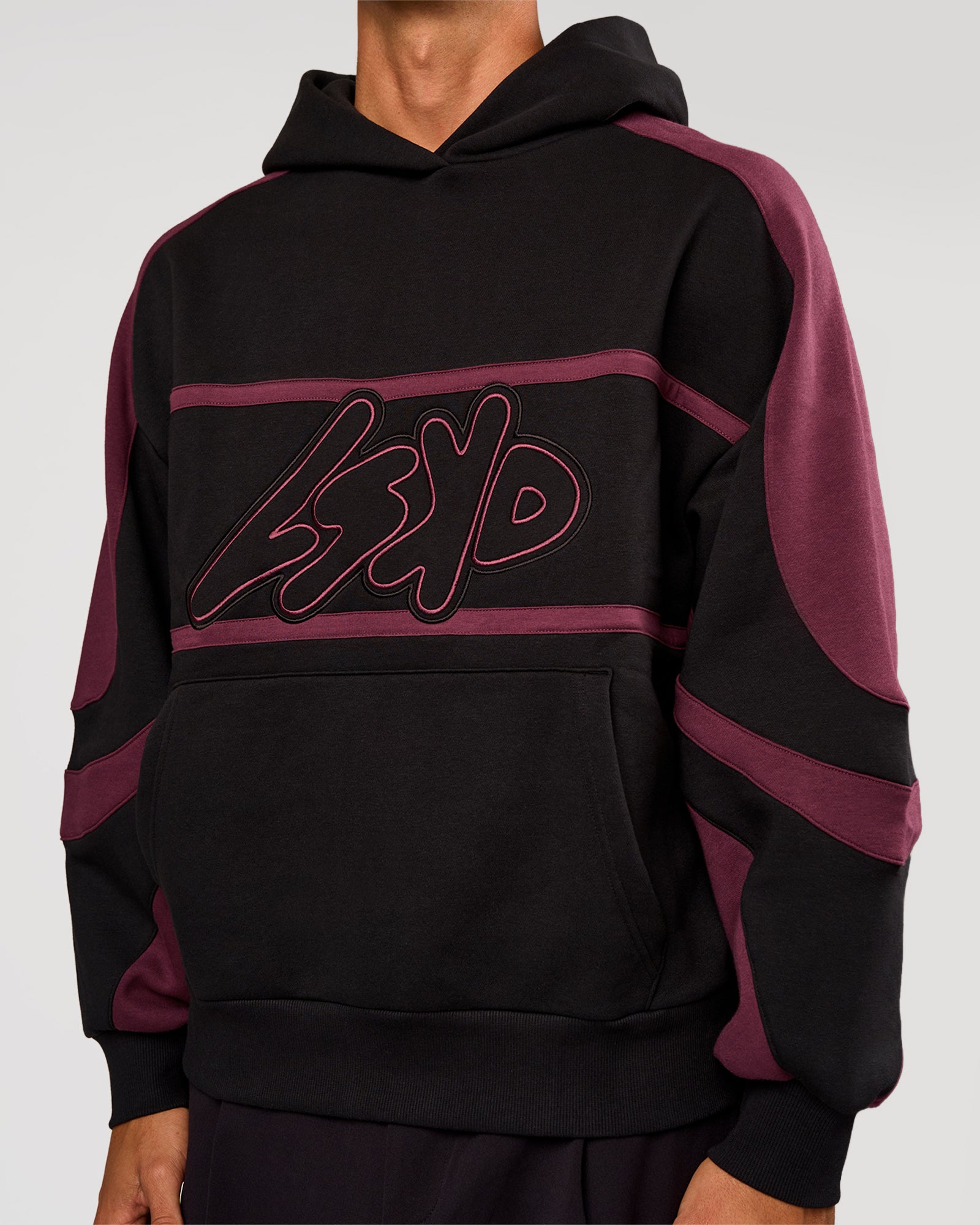 Man wearing Vibe Oversized Hoodie - Black-Cherry Lacquer | Model:Albert | Size:M