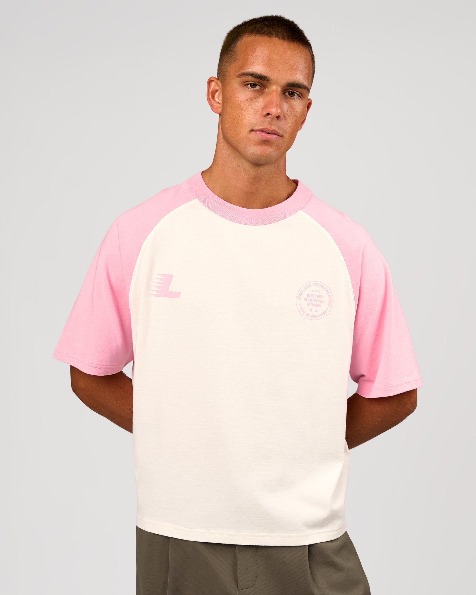 Man wearing Victory Heavyweight Boxed Raglan Tee - Off White-Pink Rose | Model:Albert | Size:M