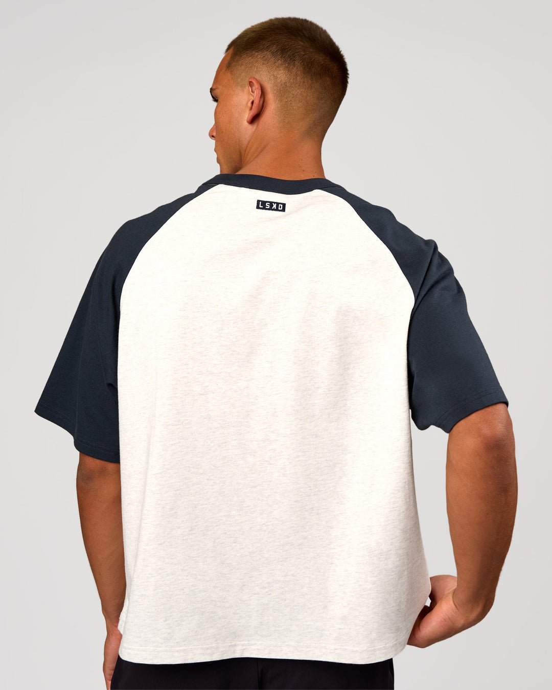 Man wearing Victory Heavyweight Boxed Raglan Tee - Silver Marl-Midnight Navy | Model:Albert | Size:M - view 4