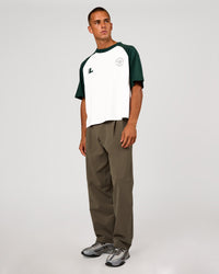 Man wearing Victory Heavyweight Boxed Raglan Tee - White-Midnight Green | Model:Albert | Size:M | Thumbnail Index: 11