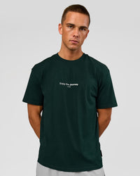 Man wearing VS1 Enjoy The Journey FLXCotton Oversize Tee - Midnight Green | Model:Albert | Size:M | Thumbnail Index: 1