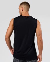 Man wearing Base FLXCotton Tank - Black | Model:Base | Size:M | Thumbnail Index: 1