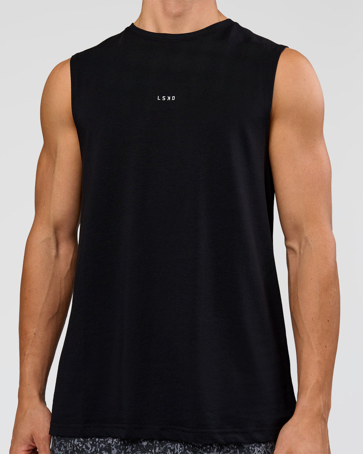 Man wearing Base FLXCotton Tank - Black | Model:Base | Size:M