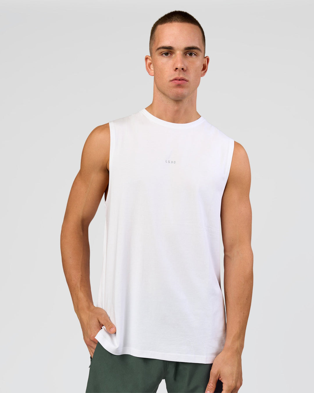 Man wearing Base FLXCotton Tank - White | Model:Base | Size:M - view 1