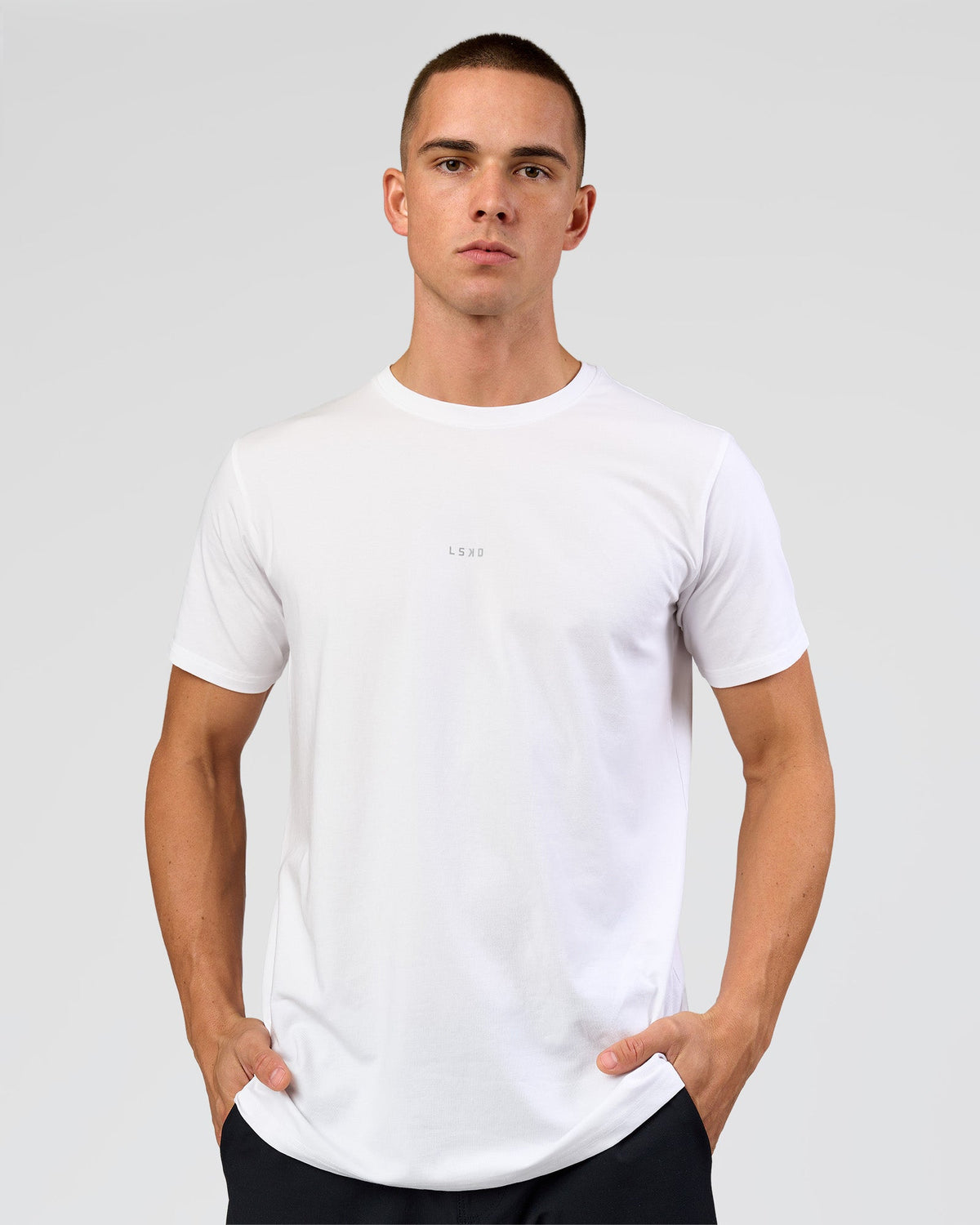 Man wearing Base FLXCotton Tee - White | Model:Base | Size:M - view 1