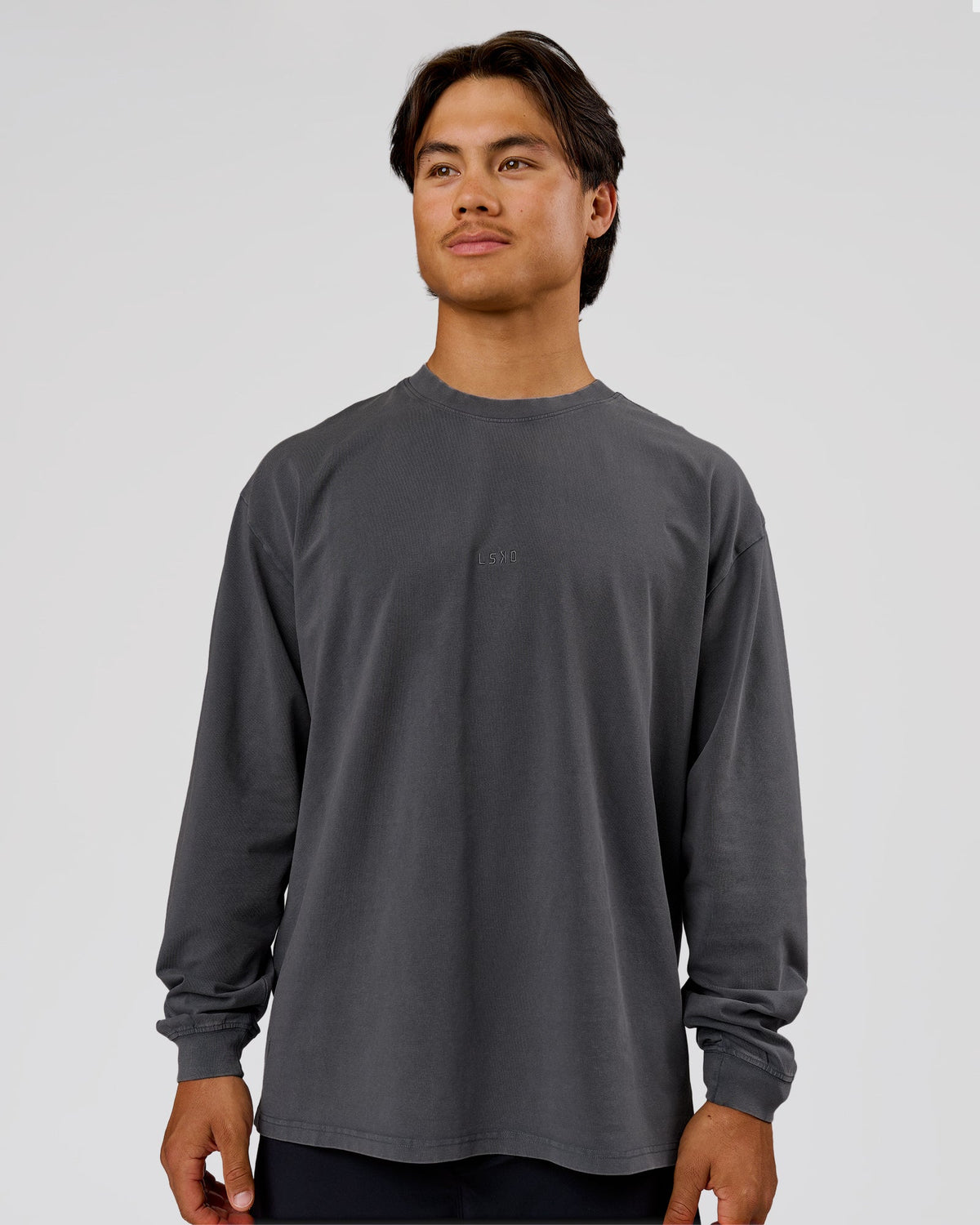 Man wearing Classic Heavyweight FLXCotton Oversized LS Tee - Dark Storm Washed | Model:George | Size:M